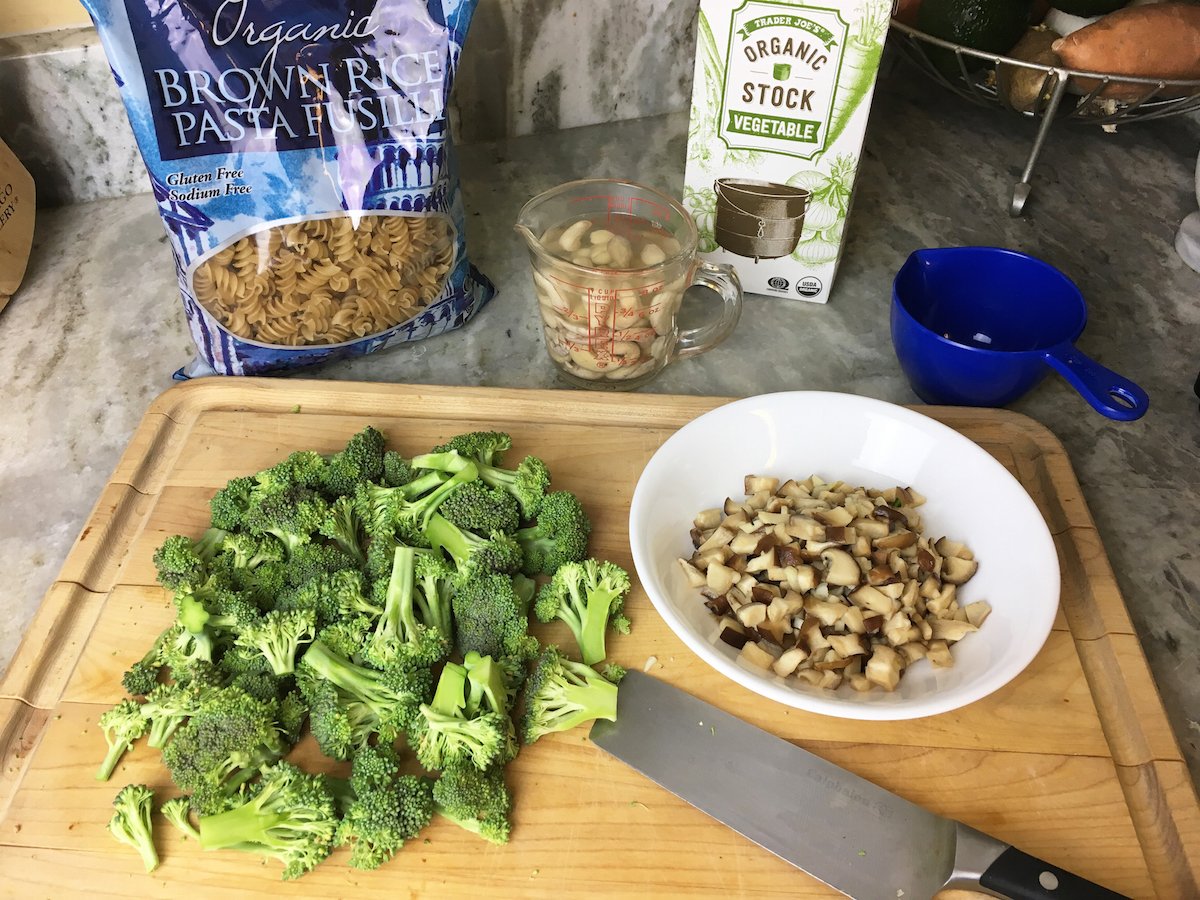 Broccoli is ready to be boiled for this creamy mushroom pasta. The mushrooms and garlic have been sauteed and set aside.