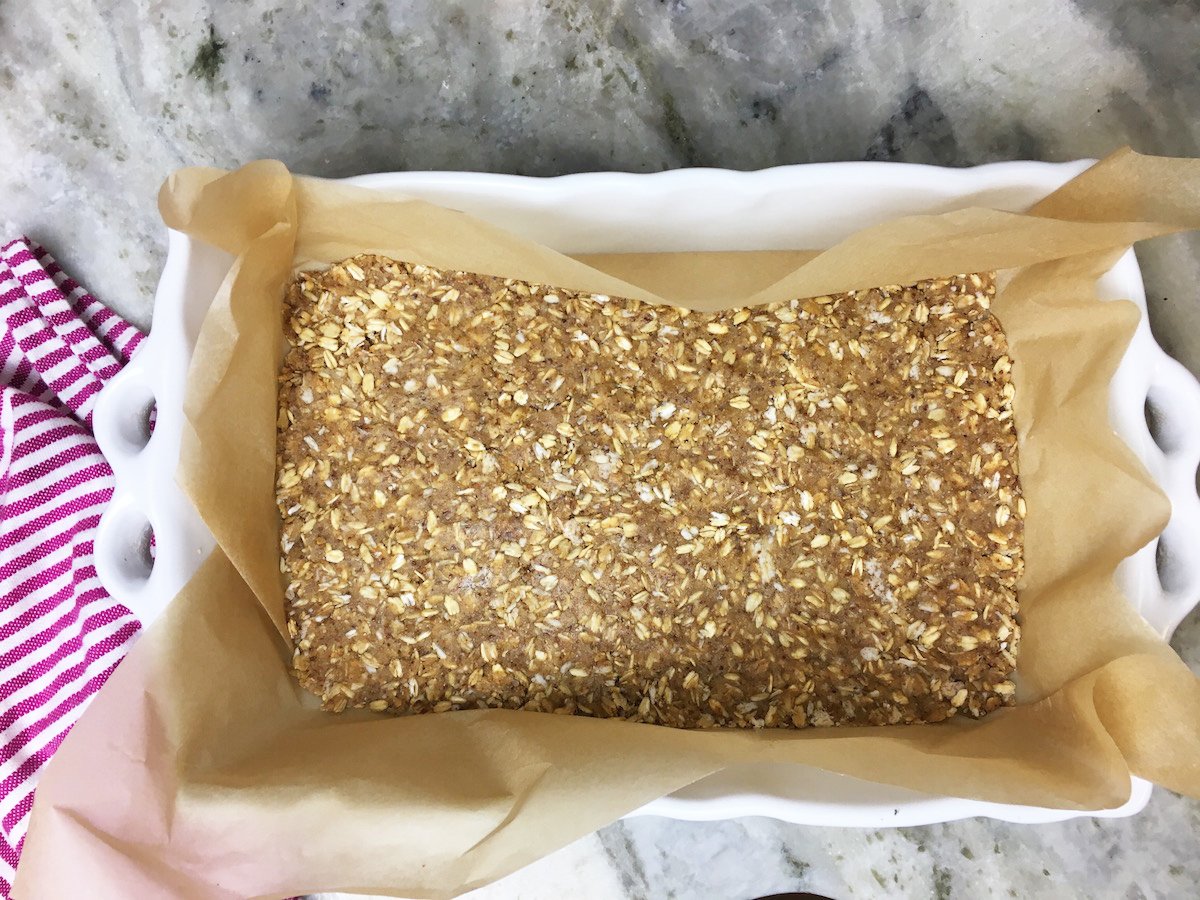 The crust mixture has been gently pressed out and is ready to go in the oven!