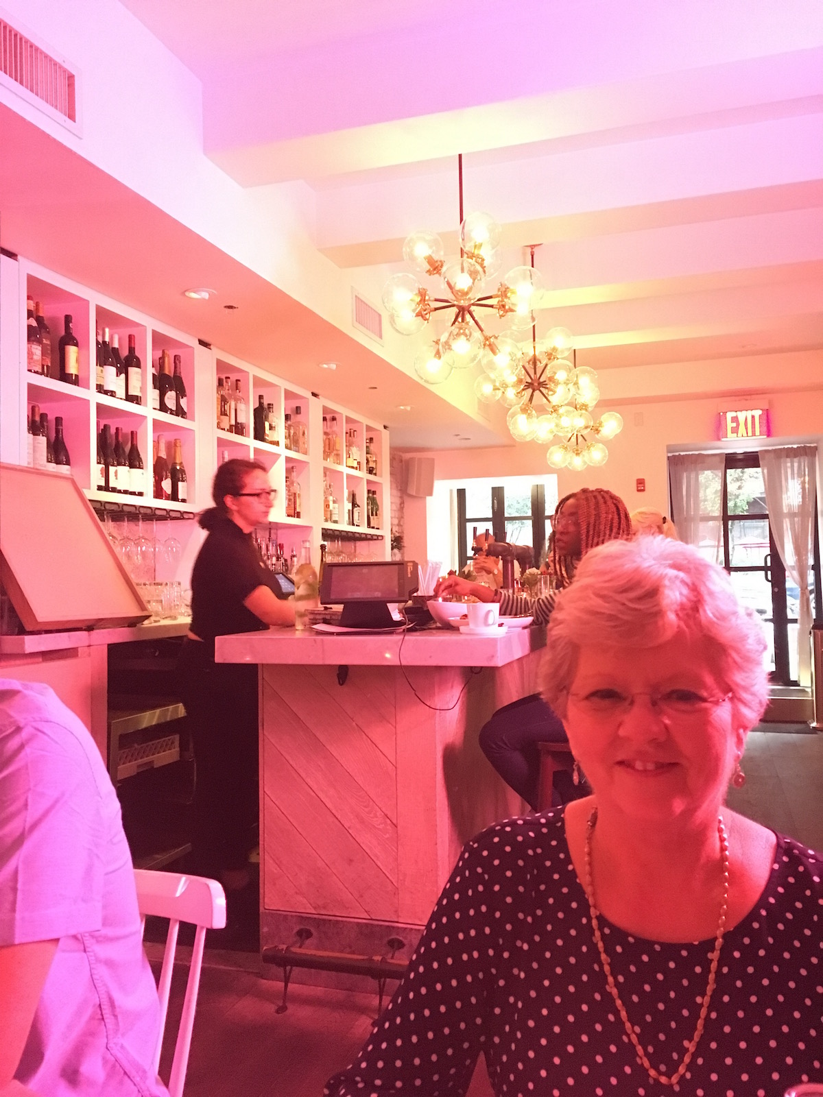 My mama, Susan, waiting to order at PS Kitchen in NYC.