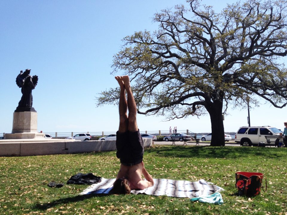 Doing yoga at White Point Gardens in Charleston, SC