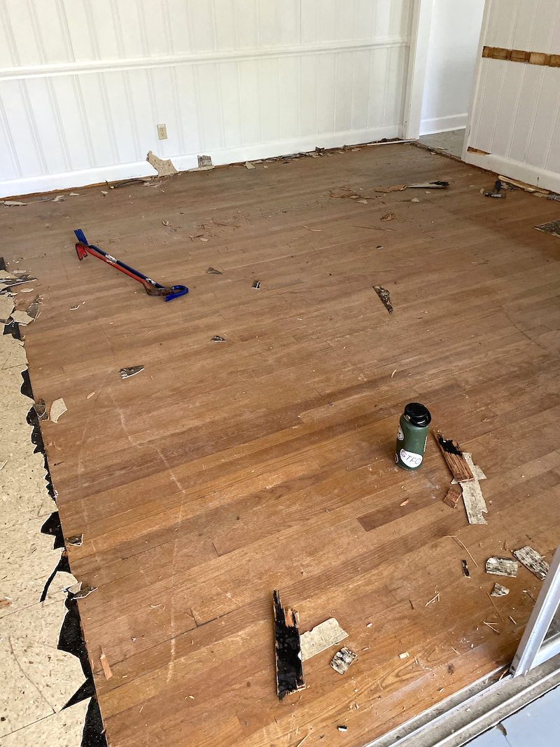 Under the carpet and 60's linoleum was hardwood floors in great condition!